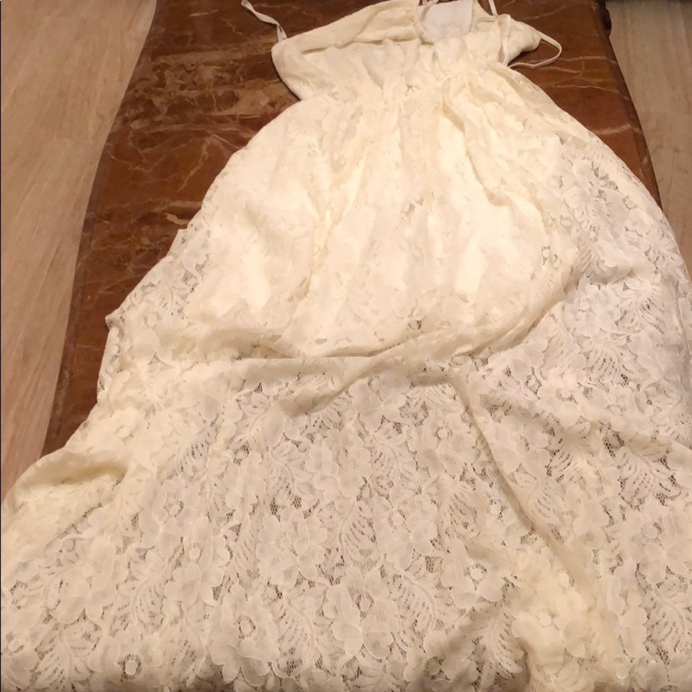 A casual dress lace a cream color